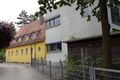 Kindergarten Regnitzgrund Stadeln Straßenseite mit altem Gebäude 1939 und Neubau, 2023