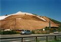 Abschluss- und Abdichtarbeiten der Mülldeponie mit Textilflies und 2,5 m dickem Langenzenner Lehm im Juli 1999
