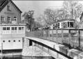 Postkarte von 2003 mit Ansicht von 1953 der <a class="mw-selflink selflink">Maxbrücke</a>, der längst abgerissenen Gaststätte  und einer von der  kommenden Straßenbahn Typ 907 Bj. 1940