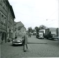 Königstraße 2 mit der Büttnerei Steger (links)</br>
 (halblinks) und Goliath Lieferwagen Firma 