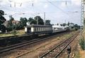 <a class="mw-selflink selflink">1991</a>: Durchfahrt eines Güterzuges mit eingestellten ICE- und IC Waggons am Bahnhof Vach