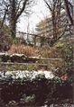 Garten in der alten Villa <!--LINK'" 0:242-->, im Hintergrund Hochhaus der abgerissenen Kinderklinik im November 2008