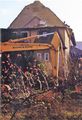 1998: Das große Lagerhaus der <!--LINK'" 0:11--> am Bahnübergang nach Steinach und Bahnhof Vach wird abgerissen. Blick auf den Wohnungsbereich von der Laderampe aus.