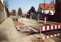 Straßenbau Arbeiten nach Abschluss der Kanalarbeiten in der <!--LINK'" 0:22--> vor der Einmündung <!--LINK'" 0:23--> Richtung Norden, im Februar 2005