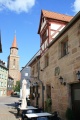 <!--LINK'" 0:136-->, im Hintergrund die Michelskirche - an der Seite das Brauzeichen von 1724.