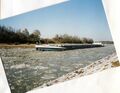 <!--LINK'" 0:77--> Kanal mit Eisschollen in <!--LINK'" 0:78-->, im Hintergrund die Hüttendorfer Brücke im Februar 2003