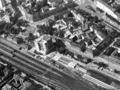 Luftaufnahme vom Bahnhofplatz, 1973 - im Bild gut erkennbar das im Bau befindliche Bahnhof-Center; noch im Bestand die später abgerissenen Gebäude, z. B. Sahlmannvilla und Hauptpost