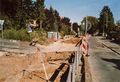 Straßenbau Arbeiten nach Abschluss der Kanalarbeiten in der <!--LINK'" 0:32--> an der Einmündung <!--LINK'" 0:33--> Richtung Norden, links Wohnanlage <!--LINK'" 0:34--> im September 2004