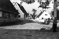 Die Romminggasse von der ehem. Hauptstraße aus gesehen, 1941. Gebäudeteil links <!--LINK'" 0:14-->, Fachwerknebengebäude hinten <a class="mw-selflink selflink">Romminggasse 17a</a>