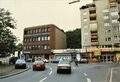  Blick auf die Gebäude  und  mit Firma  heute <a class="mw-selflink selflink">NORMA</a>. Alte Straßenführung, links noch  Gleise der Wendeschleife im Juli 1997