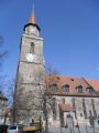 Ansicht von Süden auf den Turm und einen Teil des Kirchenschiffes von <!--LINK'" 0:90--> am Kirchenplatz