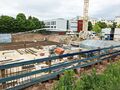 Blick von der <!--LINK'" 0:24--> auf den Neubau der Dreifachsporthalle Seeackerschule im Juni 2022