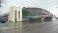 Südl. ehemaliger Hangar am früheren <!--LINK'" 0:19--> Bj. ca. 1935 jetzt modern umgebauter Firmensitz im <a class="mw-selflink selflink">Golfpark Fürth</a>, 2010