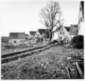Der durch Bombenvolltreffer zerstörte Bauernhof der Familie Ulrich mit 3 Todesopfer (Katharina Ulrich, geb. Romming, Johann Michael Ulrich, Leonhard Ulrich) in  am 26. Februar 1943